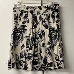 Cabi brand cotton pleated short skirt. Cream color with black & purple